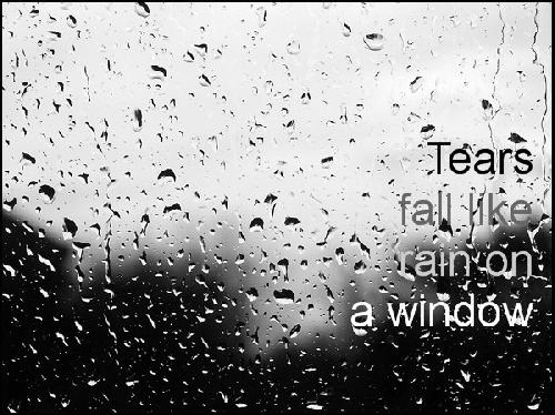 Tears fall like rain on a window